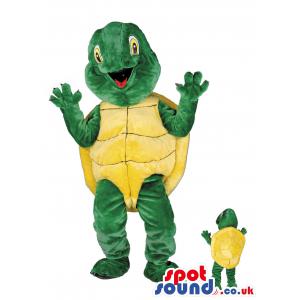 Turtle mascot in a green pant and in yellow top in a surprise -