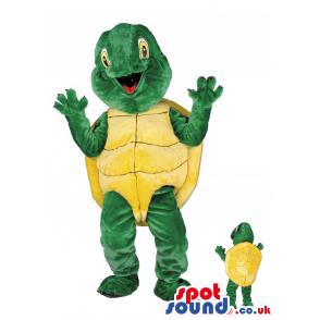 Turtle mascot in a green pant and in yellow top in a surprise -