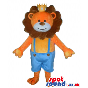 Orange lion with brown hair wearing blue trousers and a yellow