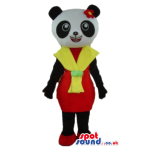 Female panda wearing a yellow and red dress and a matching