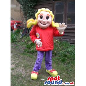 Delighted blond girl mascot with red blouse and violet trousers