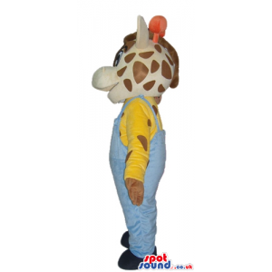 Giraffe dressed in a yellow t-shirt and light-blue gardener