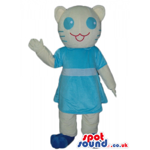 White cat dressed in lightblue dress and blue shoes with big