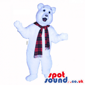 White, happy bear mascot with red and black checkered scarf -