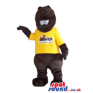 Dark brown beaver mascot with white teeth and yellow shirt -