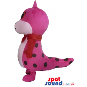 Pink and red dragon with a violet tongue wearing a red scarf -