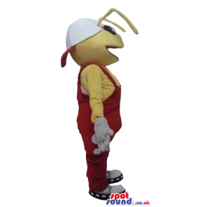 Yellow ant wearing white shoes and red gardener trousers -