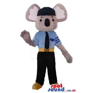 Beige mouse dressed as a pilot with black trousers, blue shirt