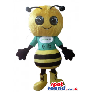 Large headed bee wearing a green t-shirt with logo in the front