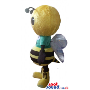 Large headed bee wearing a green t-shirt with logo in the front