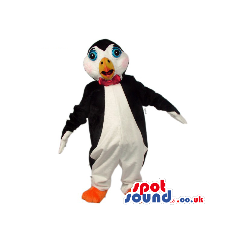 Black and white penguin with red bow tie, orange beak and feet