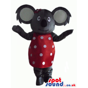 Grey koala with big ears wearing a polka dot red and white