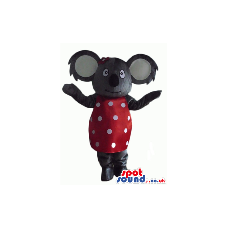 Grey koala with big ears wearing a polka dot red and white