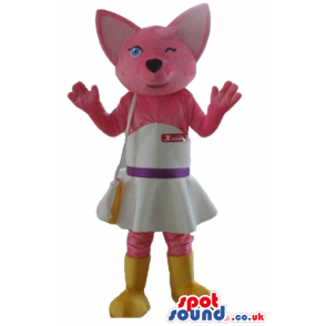 Pink cat wearing a white and pink dress, a matching bag and