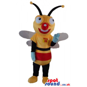 Bee with a big red nose wearing a yellow, black and red t-shirt