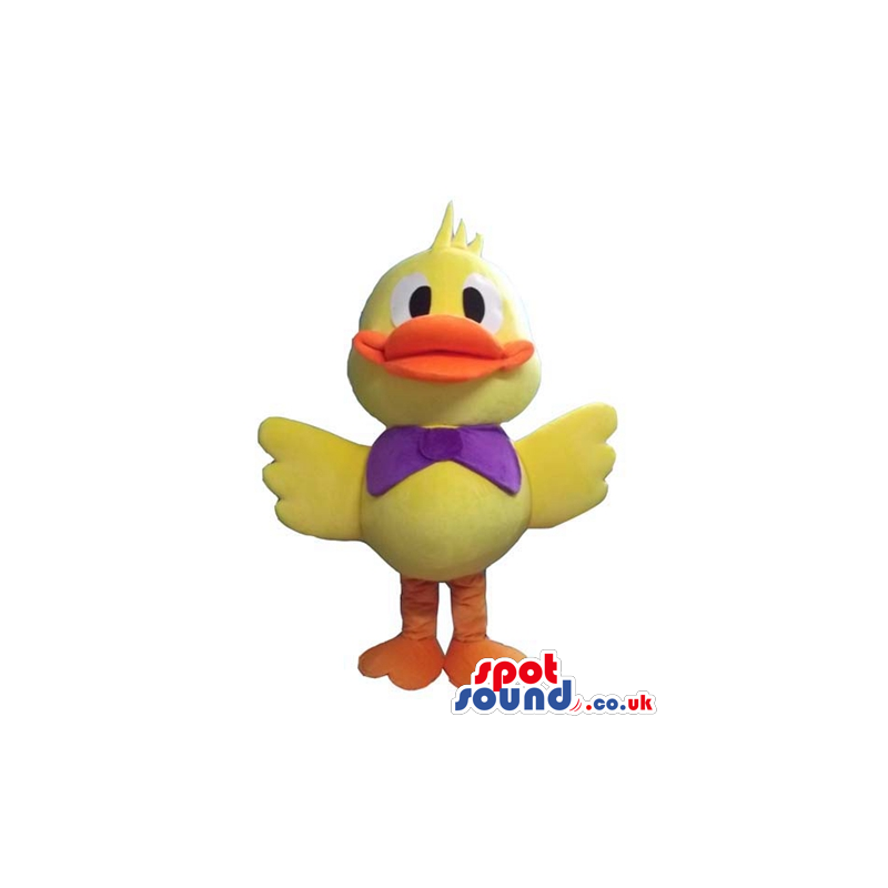 Yellow duck with orange beak and legs wearing a purple bow tie