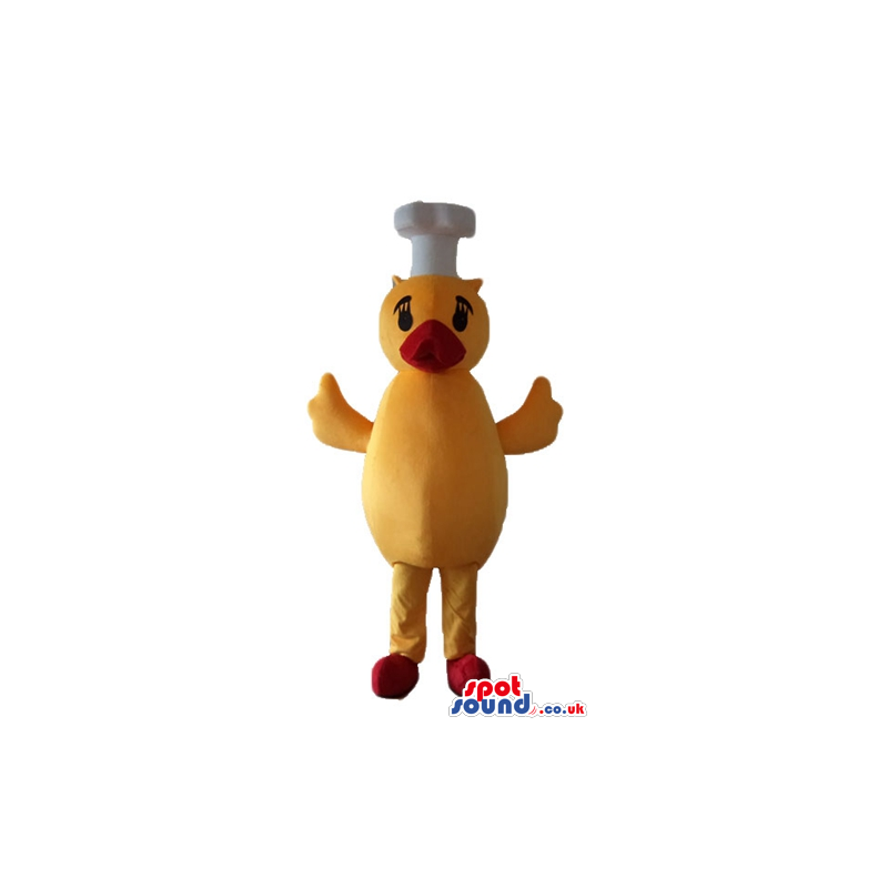 Yellow chicken with a red beak and feet wearing a chef's hat -