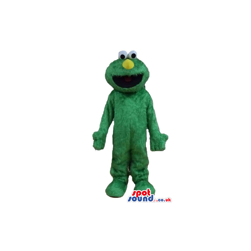 Green furry monster with a round yellow nose and round eyes -