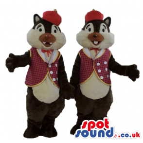 Twin brown and beige squirrels wearing a red hat and a checked