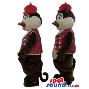 Twin brown and beige squirrels wearing a red hat and a checked