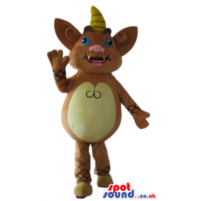 Brown monster with blue eyes, a pink nose and a yellow horn on