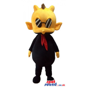 Yellow guy with brown punk hair dressed in black with a red tie