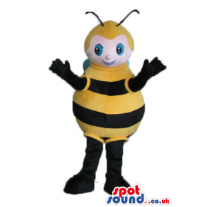 Bee with black arms and legs with blond hair and blue eyes -