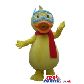 Yellow duck with an orange beak wearing a red scarf and