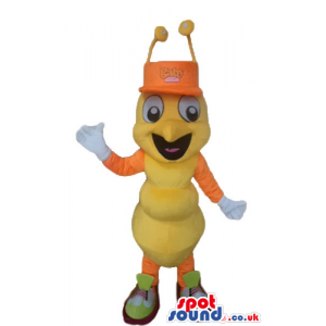 Yellow bug with big eyes and orange arms and legs wearing white