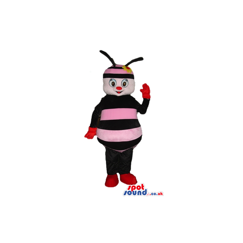 Pink and black bee with black arms and legs wearing red gloves