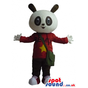 Panda bear wearing brown trousers, red shoes and a red sweater