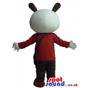 Panda bear wearing brown trousers, red shoes and a red sweater