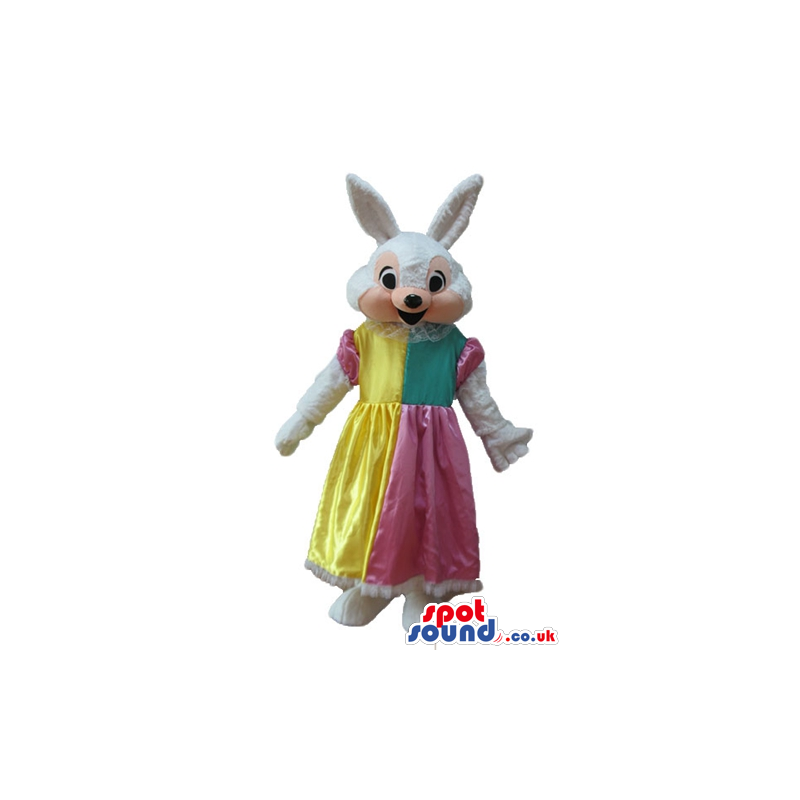 White rabbit wearing a long yellow, pink and green dress -