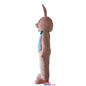 Pink rabbit wearing a printed light-blue vest and bow tie -