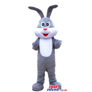 Grey rabbit with a white belly, big eyes and a red nose -