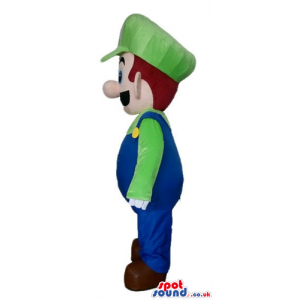 Mascot costume of super mario bros wearing a green shirt -