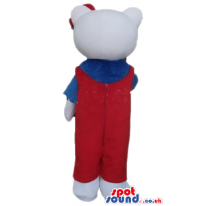 Hello kitty with a red bow wearing a blue shirt and red