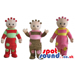 Trio of children wearing red and green clothes, brown and pink