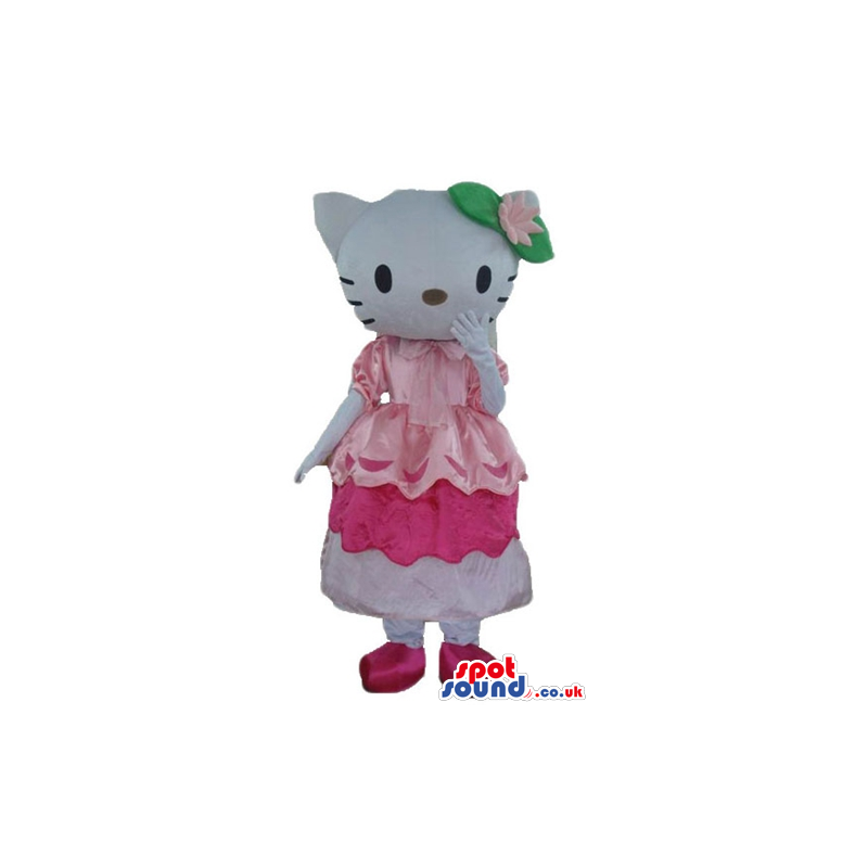 Hello kitty with green and pink flower on the head wearing a