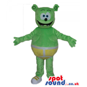 Green bear with big blue eyes wearing yellow underwear and