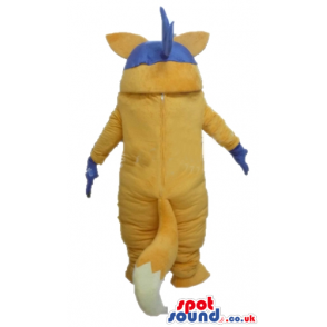 Yellow raccoon with a white belly wearing blue gloves and a