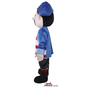 Young pirate wearing blue shorts and hat, a striped red and