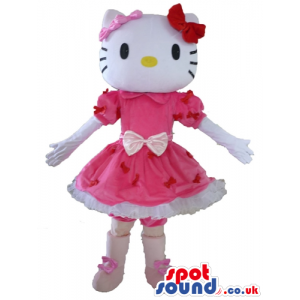 Hello kitty with 2 bows on the head and a pink and red mini