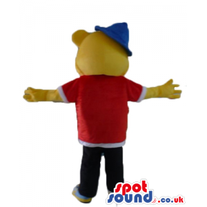 Yellow bear wearing a red and white shirt, black trousers, blue