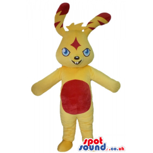Yellow monster with red details on ears, belly and forehead -