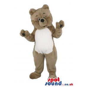 Brown-white teddy mascot with tilted head and waving his hand -