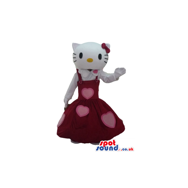 Hello kitty wearing a long sleeveless red dress with pink