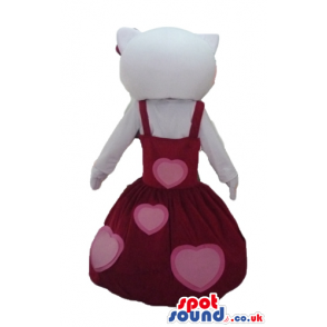 Hello kitty wearing a long sleeveless red dress with pink