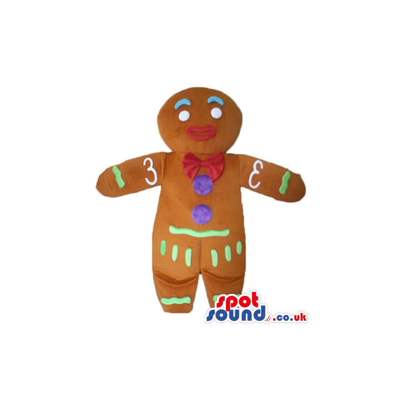 Gingerbread man with a red lace decorated in green, purple and