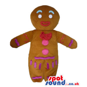 Gingerbread man decorated in red pink and violet with lightblue